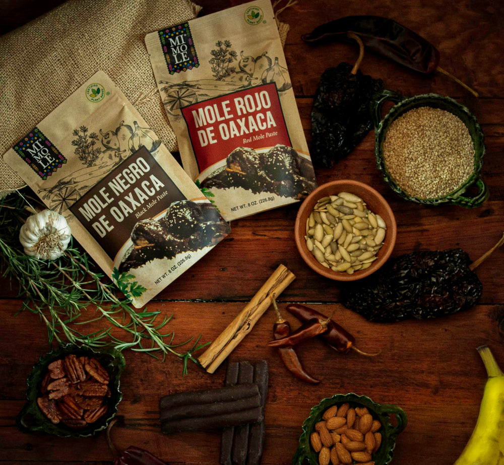 Mi Mole on a table spread with tortillas and sides demonstrating mealtime appeal