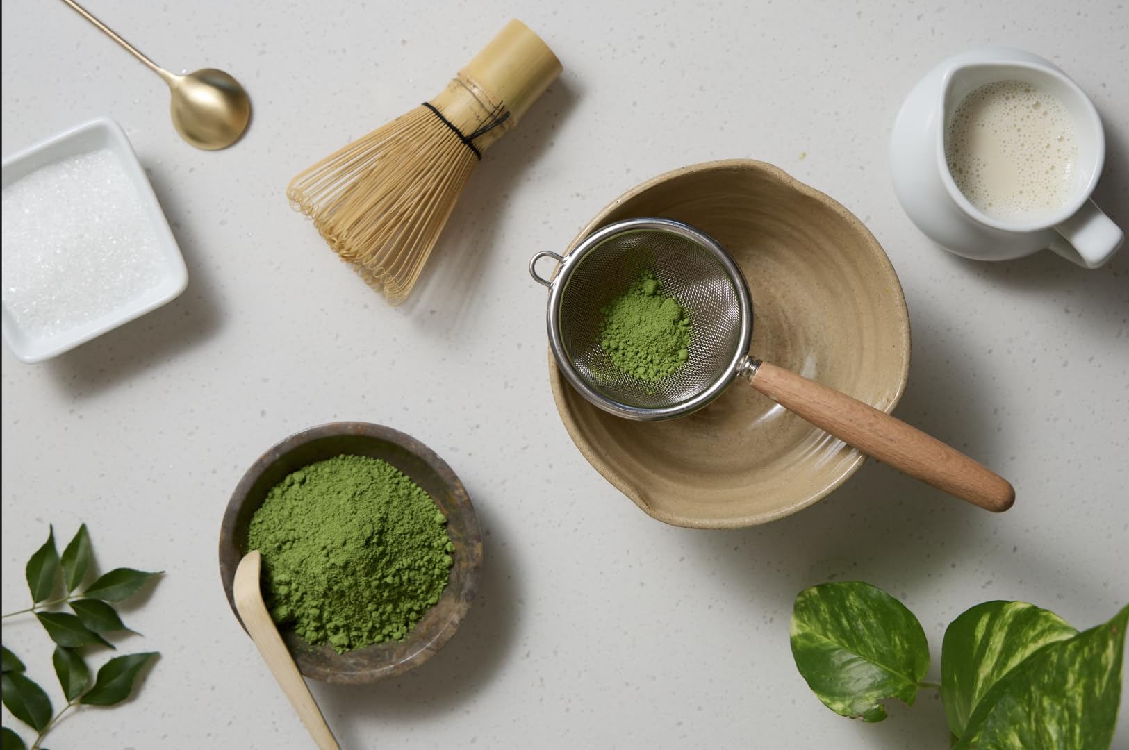 Midori Spring vibrant matcha latte in glass, illustrates creamy blend and color