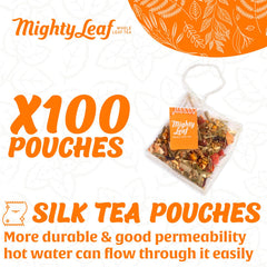 Mighty Leaf loose chamomile flowers, orange peel and lemongrass displayed for ingredient clarity