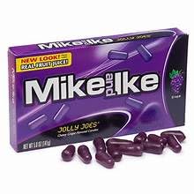 LYZA'S SWEETS & TREATS Mike & Ike held in hand showing size and grab-and-go benefit