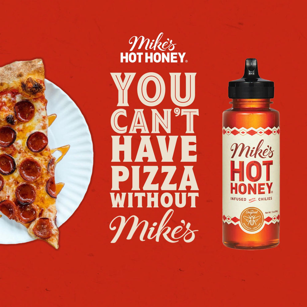 Mike's Hot Honey close-up texture with chili flecks highlighting flavor intensity