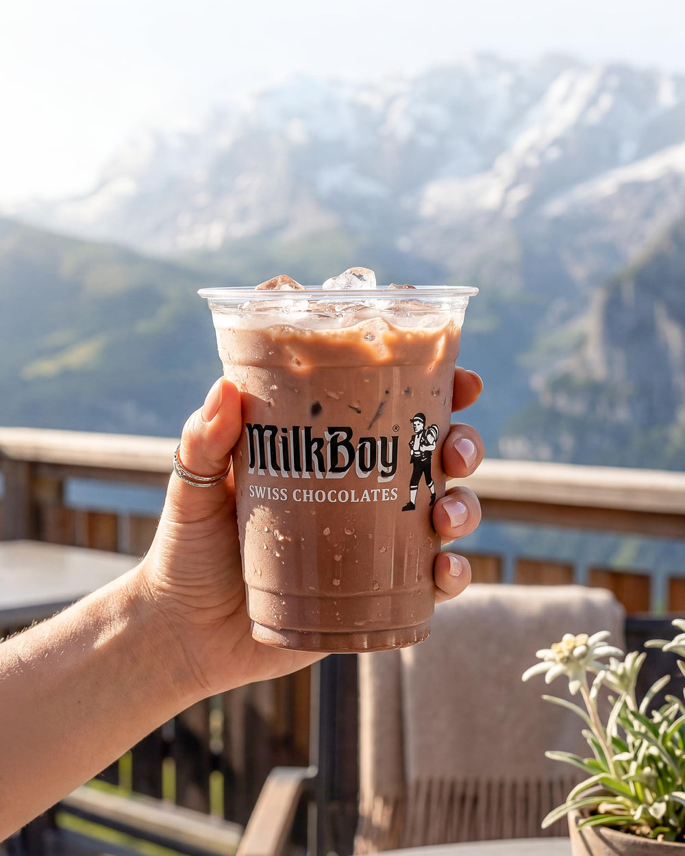 MilkBoy hot chocolate in cozy scene, evokes warming comfort benefit