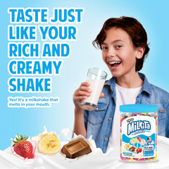 Milkita unwrapped pop on spoon showing smooth candy center