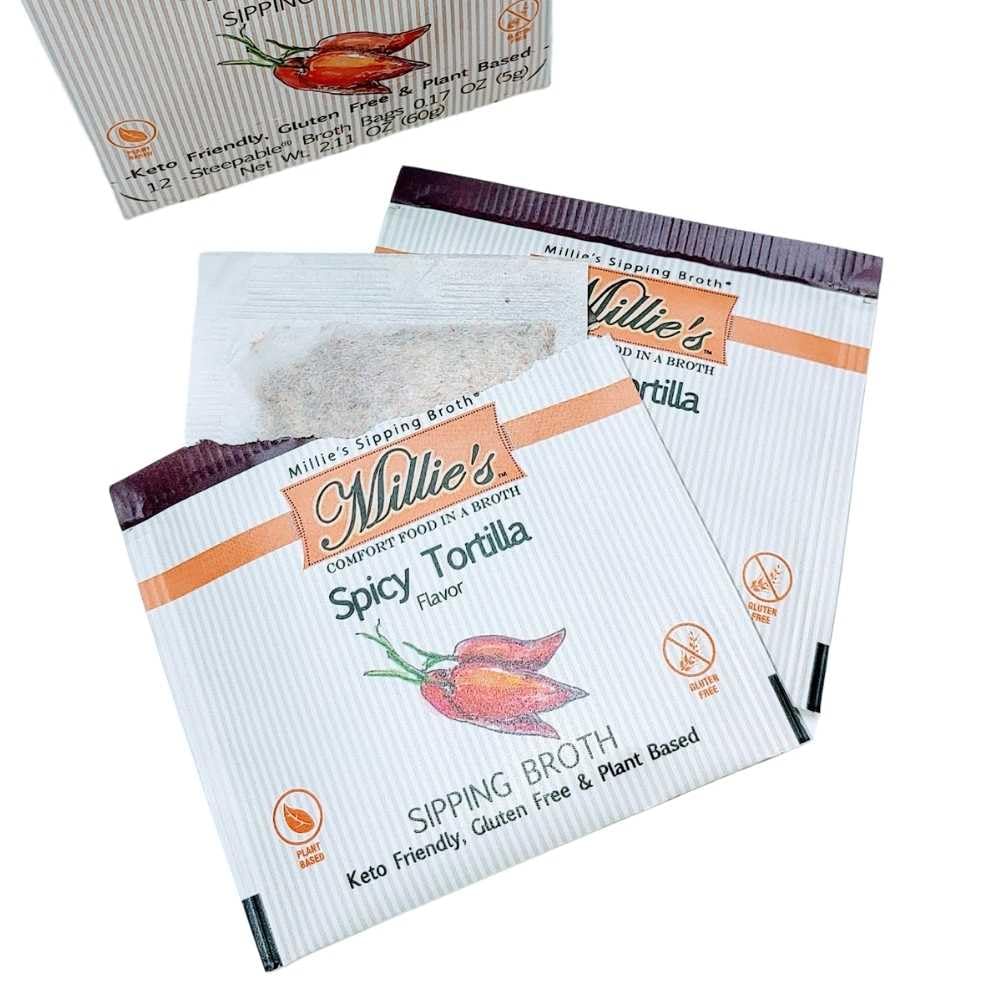 Millie's Sipping Broth ingredient flatlay showing vegetables and herbs