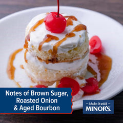 Minor's bourbon sauce pouring from jug spout onto meat, demonstrating easy application