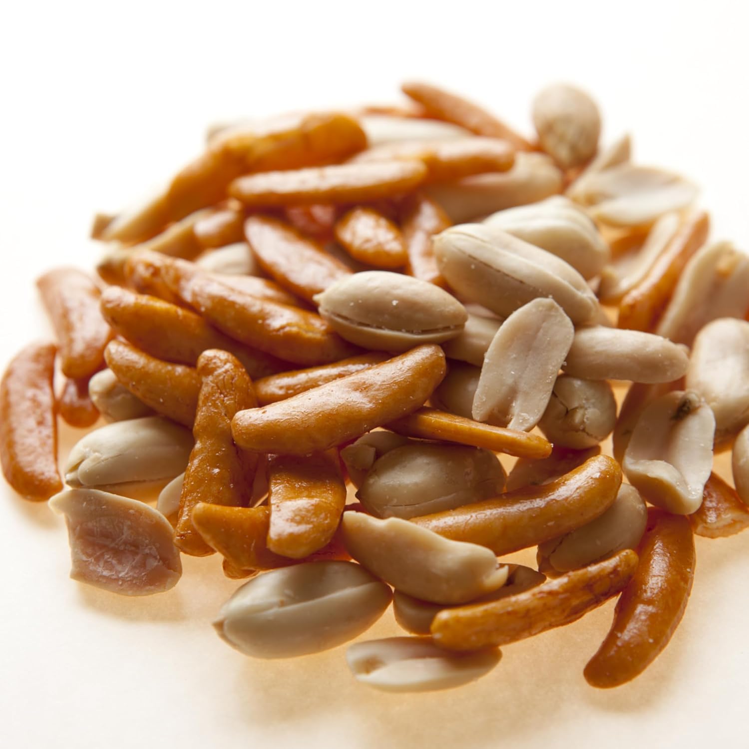MINOYA crackers and roasted peanuts on plate demonstrating balanced crunch