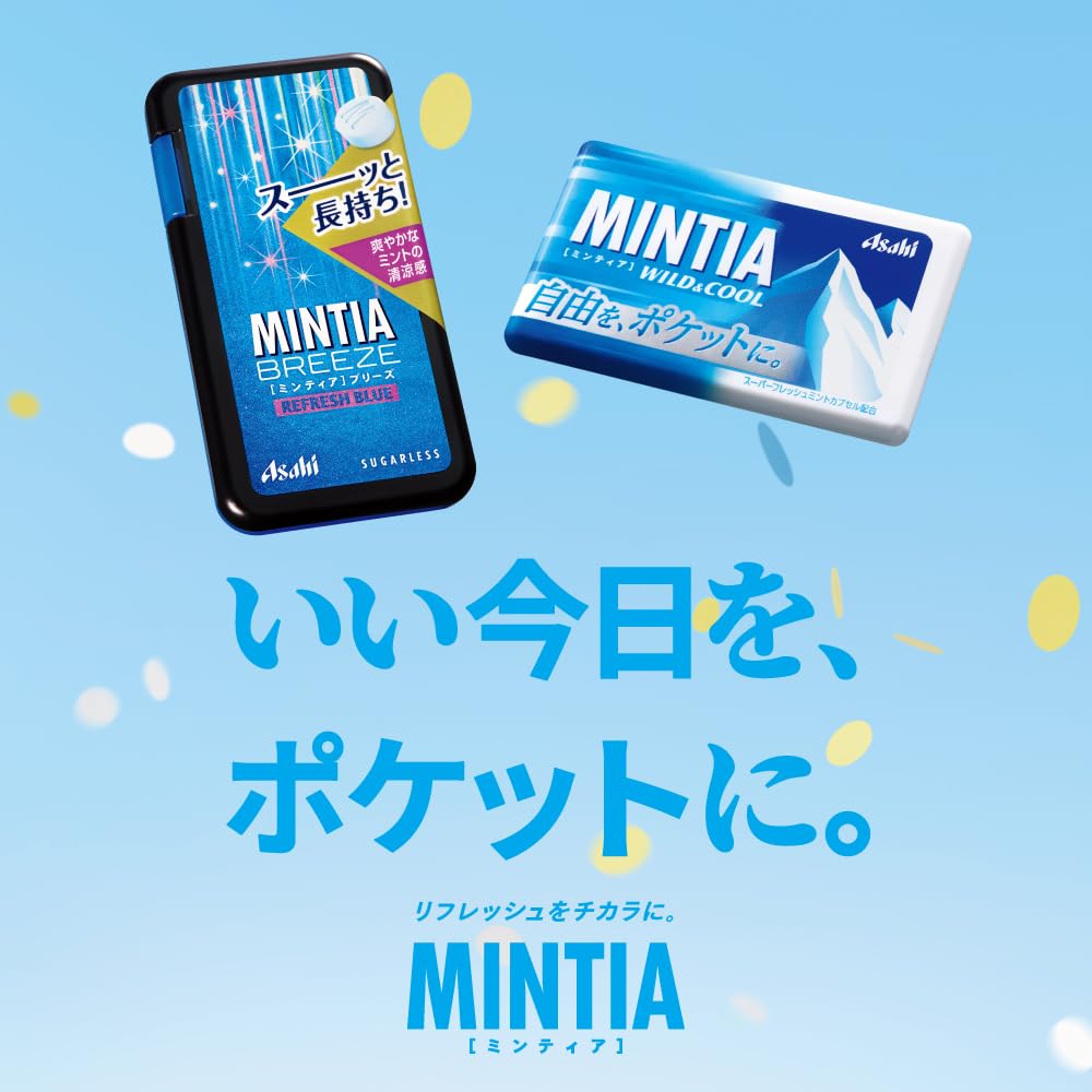 hand holding Mintia Cold Smash tin on a train commute demonstrating convenience and quick use