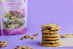 Miss Jones Baking cookie held in hand to show size and chewy texture for portion reference