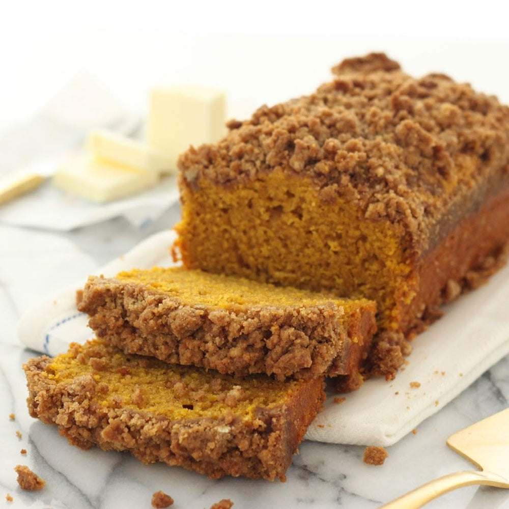 Miss Jones Baking sliced pumpkin bread showing moist crumb and whole grain goodness