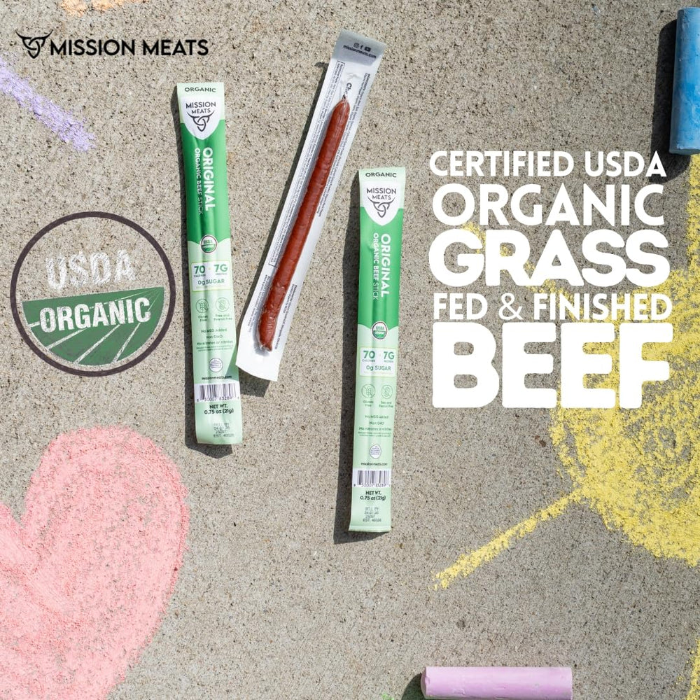 Mission Meats stick held in hand demonstrating compact size and easy portability