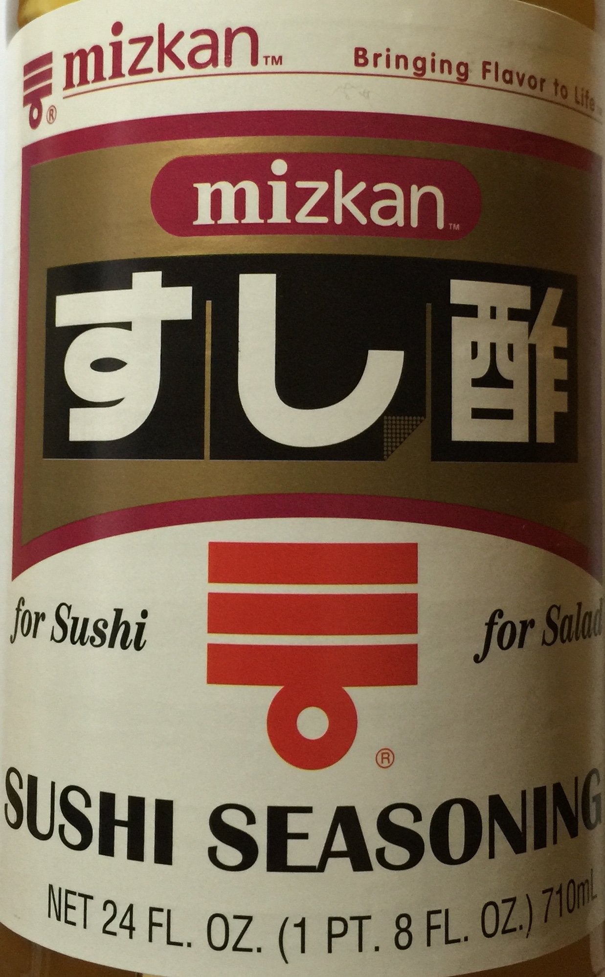 Mizkan pouring seasoning into sushi rice for fast consistent flavor