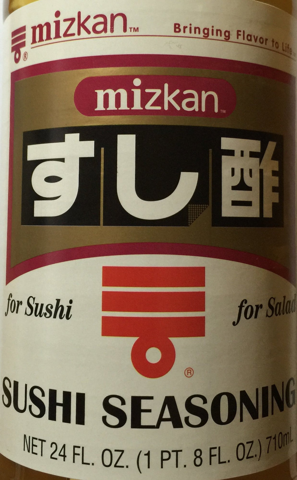 Mizkan pouring seasoning into sushi rice for fast consistent flavor