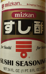 Mizkan pouring seasoning into sushi rice for fast consistent flavor