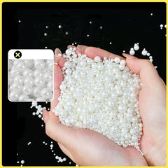 Mkostlich close-up cluster of white pearls highlighting glossy finish benefit