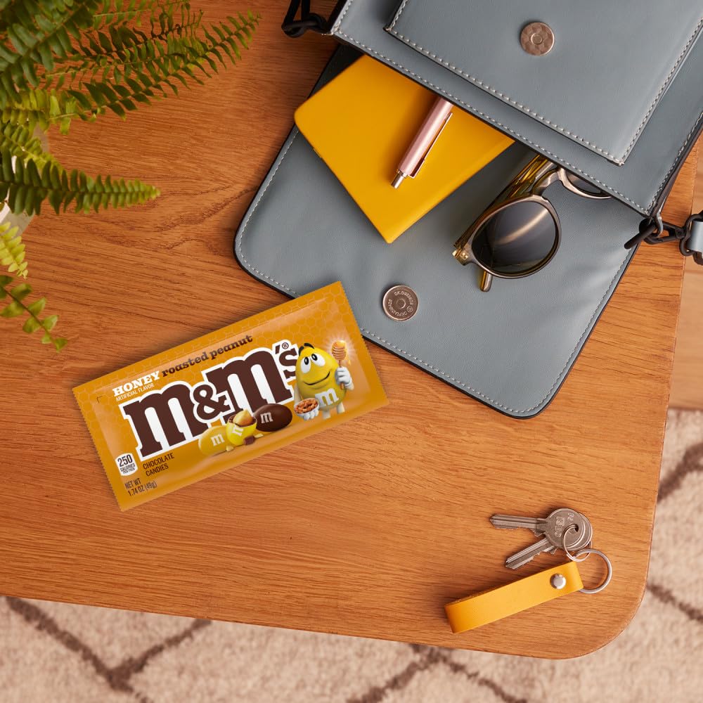 Cross-section of M&M'S revealing honey roasted peanut center and chocolate coating