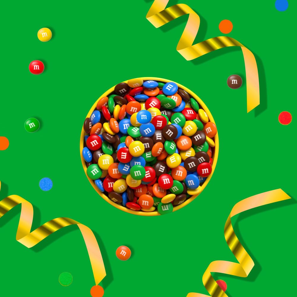 M&M's topping on cupcake adding colorful decoration and chocolate bite