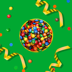 M&M's topping on cupcake adding colorful decoration and chocolate bite