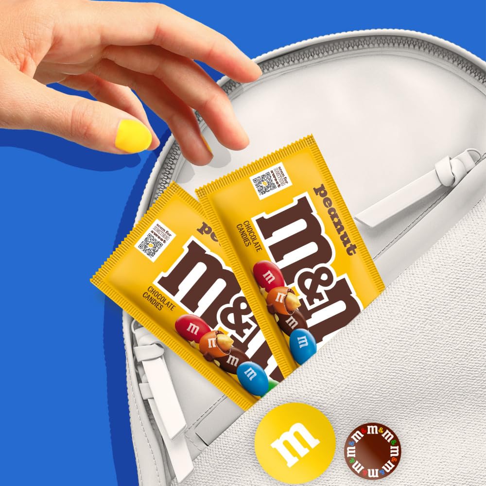 Close texture shot of M&M'S shells and peanut center, highlights crunchy bite