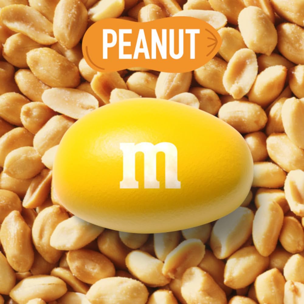 M&M'S close-up of colorful candy shell highlighting crunchy peanut and chocolate bite