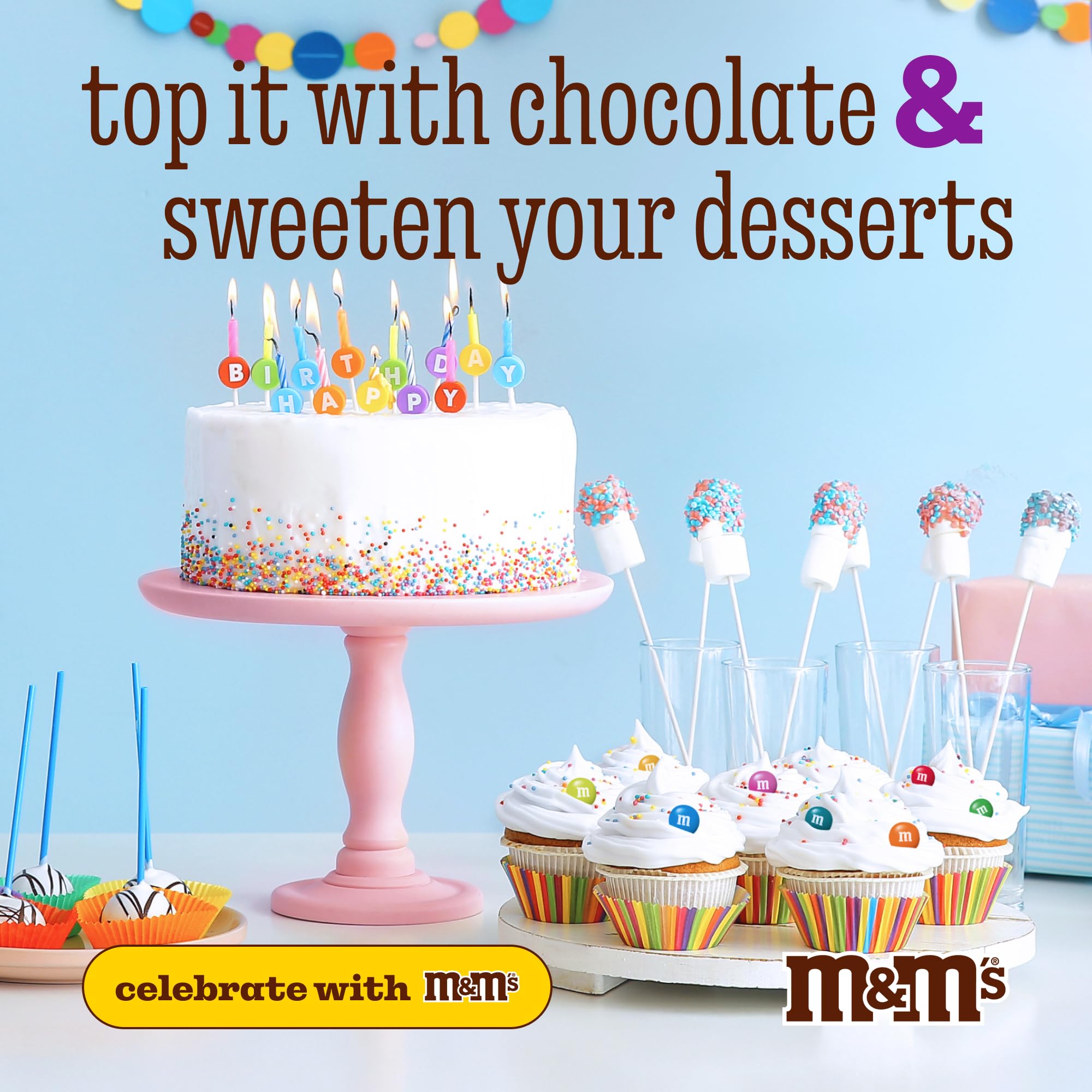 M&M’S WORLD orange candies beside a quarter showing size and portioning ease