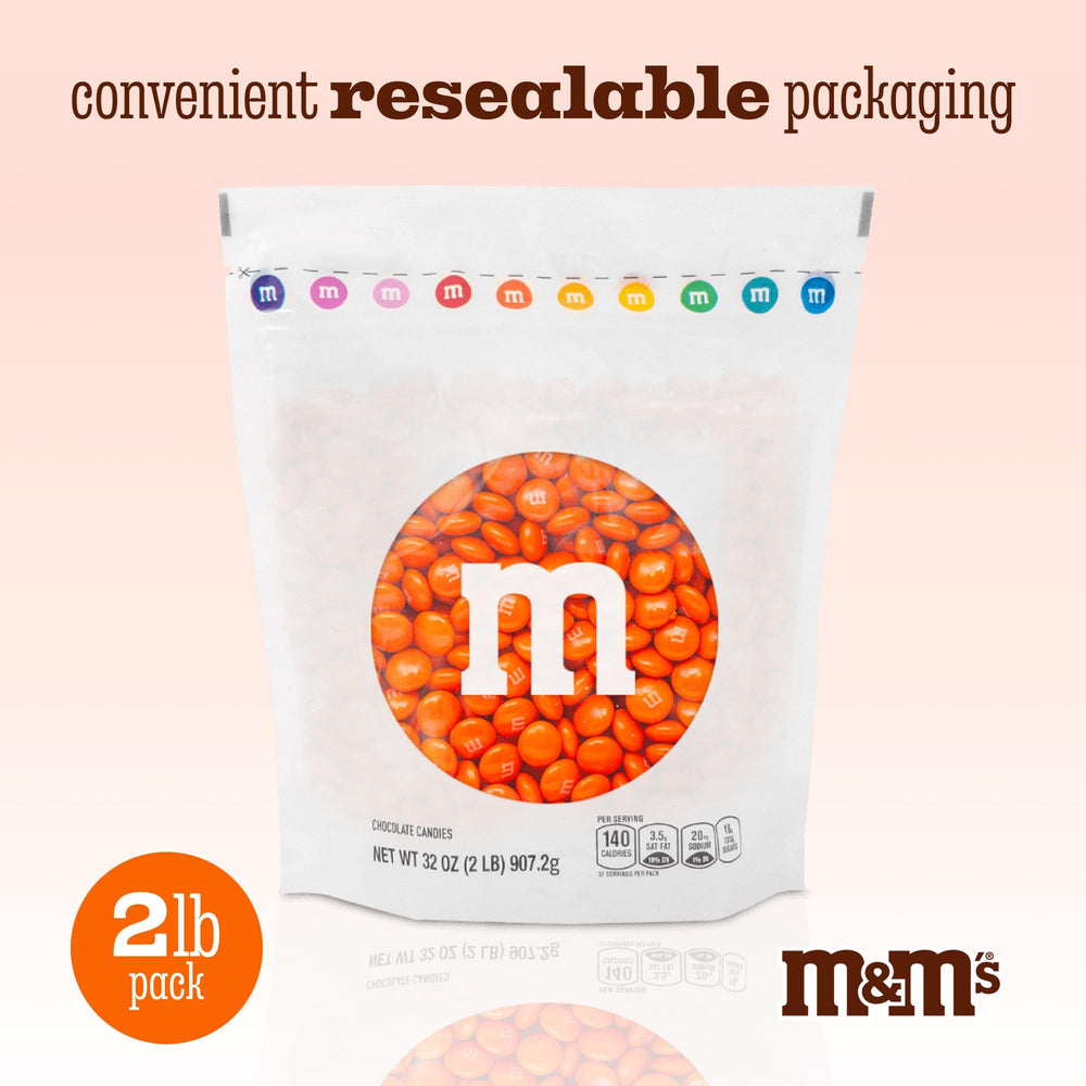 M&M’S WORLD bowl of orange M&M'S on table for easy party serving convenience