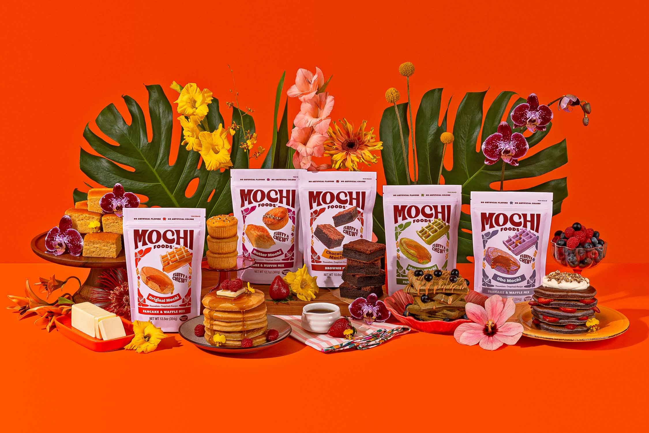 Mochi Foods brownies styled in Hawaiian setting showing festive serving benefit