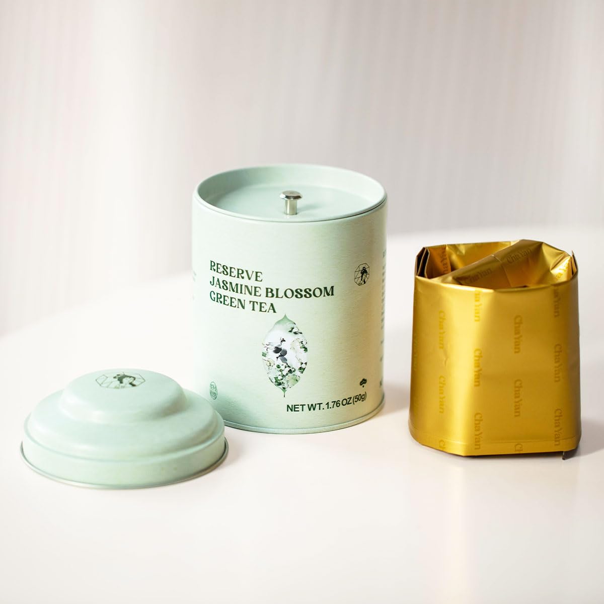 MODERN CHINA TEA SHOP measuring spoon and tin illustrating easy portioning