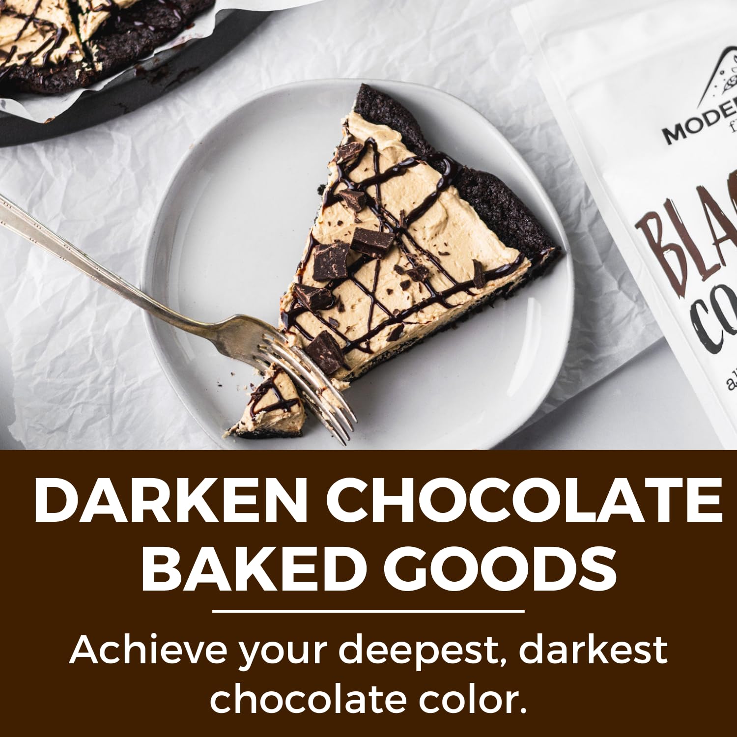 MODERN MOUNTAIN dark buttercream frosting spread on cake showing smooth color benefit