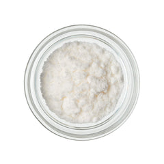 Modernist Pantry N‑Zorbit on spoon beside scale to show measuring convenience