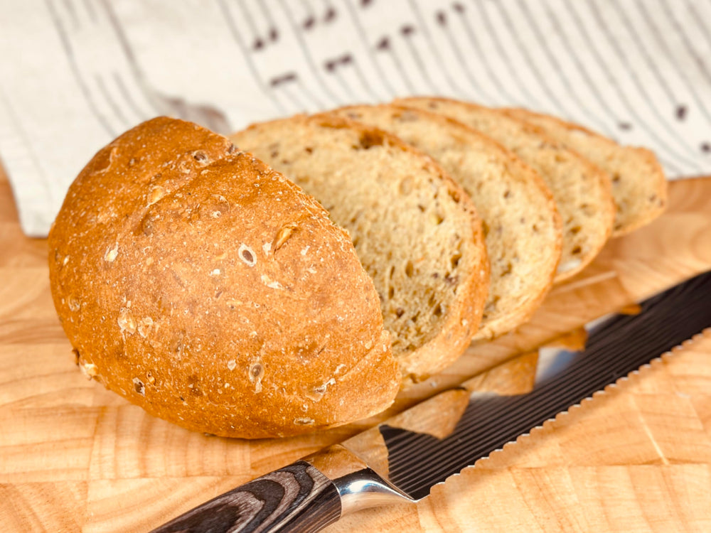 Molibake oven-baked multigrain loaf cooling in a 5x9 pan