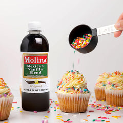 Molina vanilla blend pouring into a mixing bowl to boost baked goods flavor