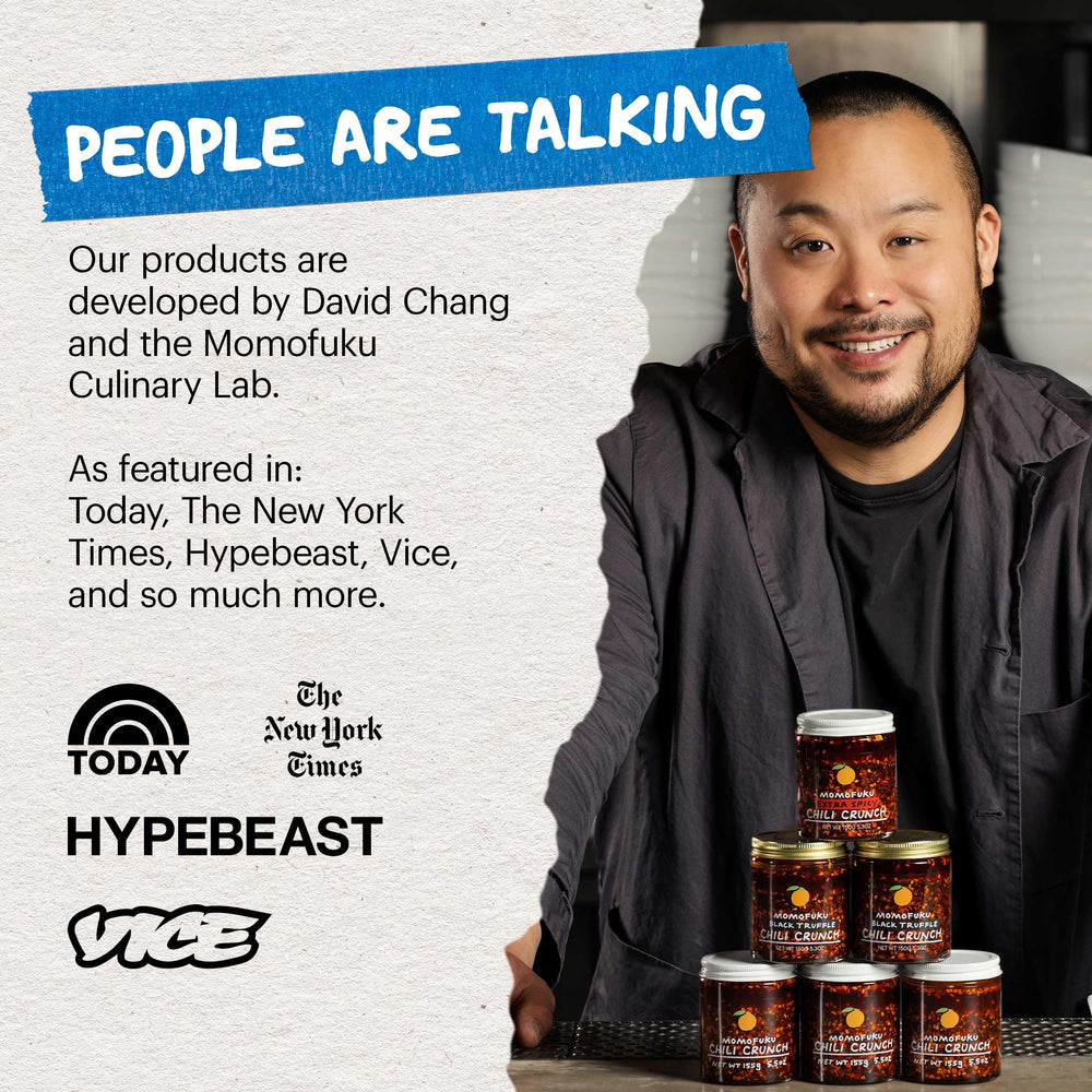 spoonful of Momofuku chili crunch eating noodles, adds heat and umami