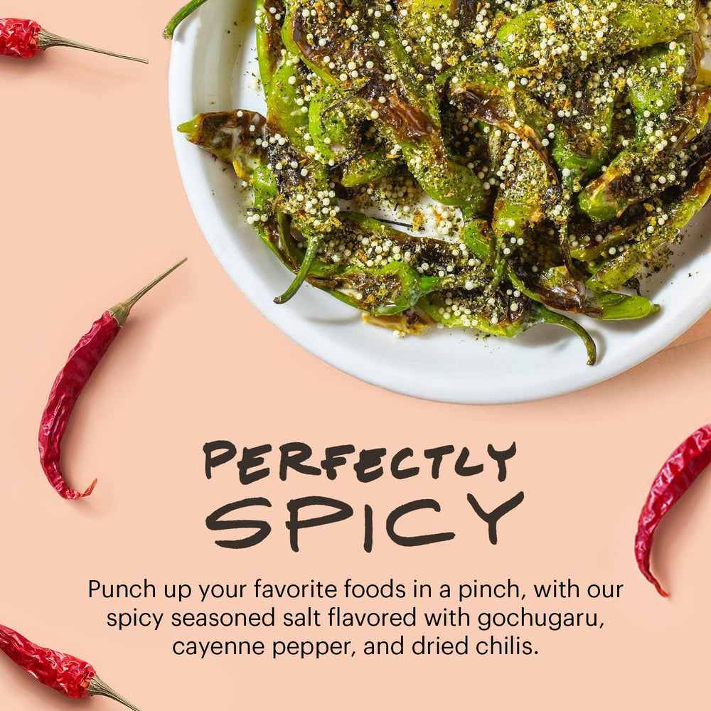Sprinkling Momofuku seasoning on pizza, delivers instant savory and spicy boost