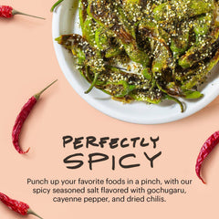 Sprinkling Momofuku seasoning on pizza, delivers instant savory and spicy boost