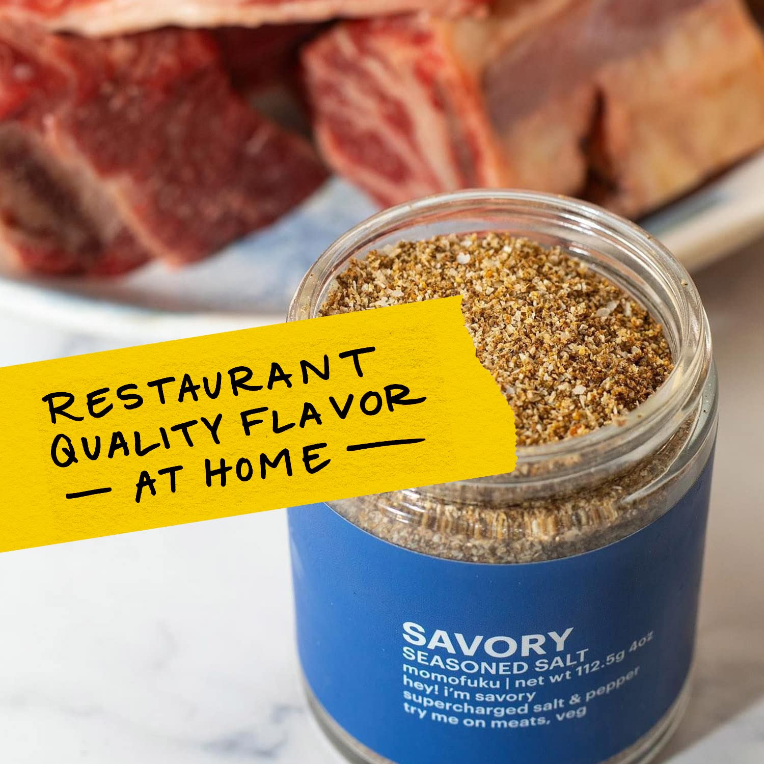 Momofuku jar next to spoon showing 4-ounce size and portioning benefit