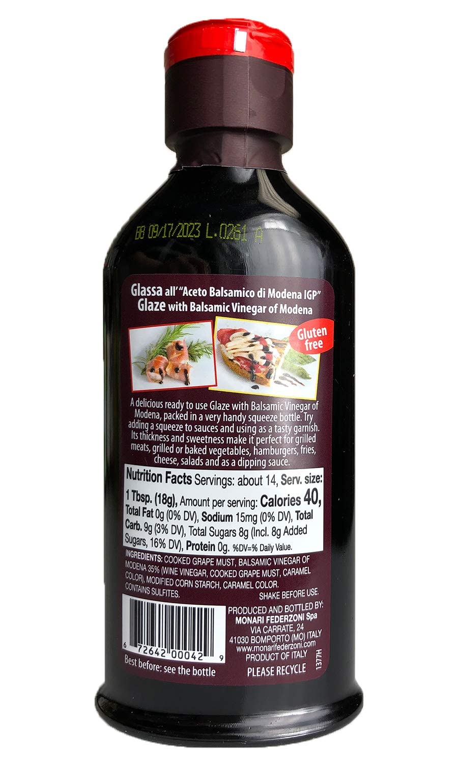 Close-up pour of Monari Federzoni glaze highlighting syrupy texture and glossy finish