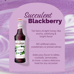 Monin blackberry syrup pouring into a cocktail, adding vibrant color and flavor