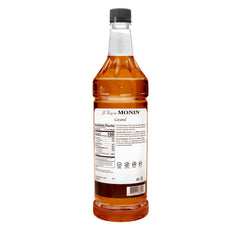 Monin caramel syrup drizzled over ice cream highlighting flavor and dessert enhancement