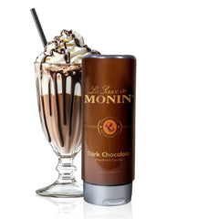 Monin bottle front view showing label and 12 fl oz size, clear branding and application