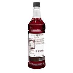 Close-up of Monin Desert Pear label highlighting ingredients and non-GMO note