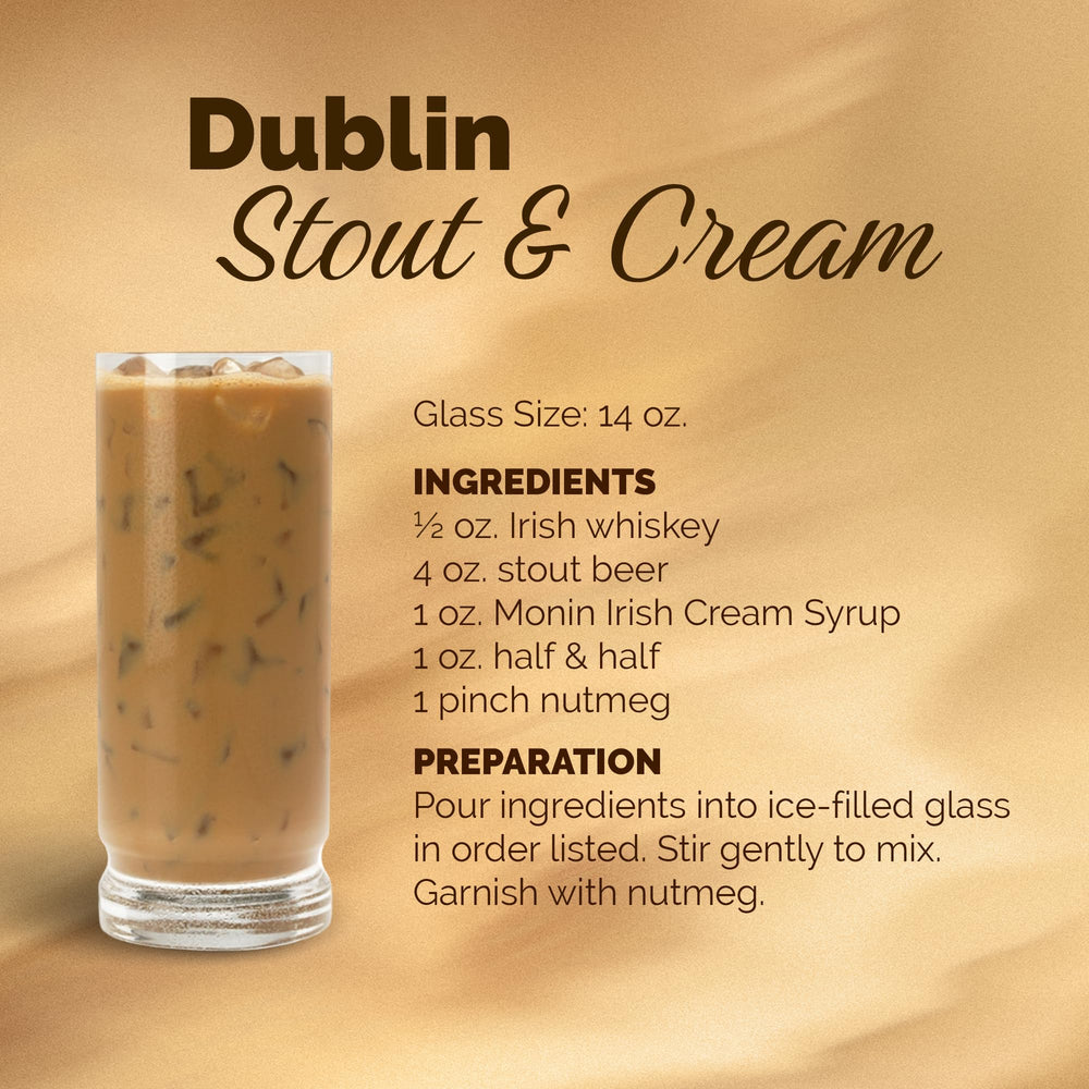 Monin Irish Cream next to a cup for scale, illustrating bottle size and value