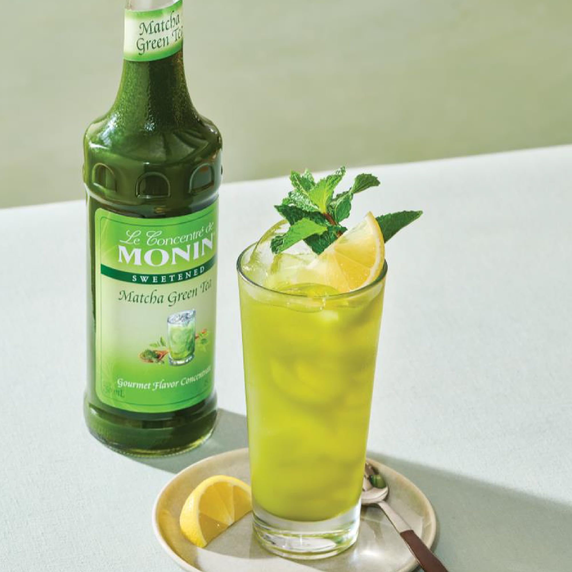 Monin matcha iced lemonade in glass showing bright color and refreshing beverage option
