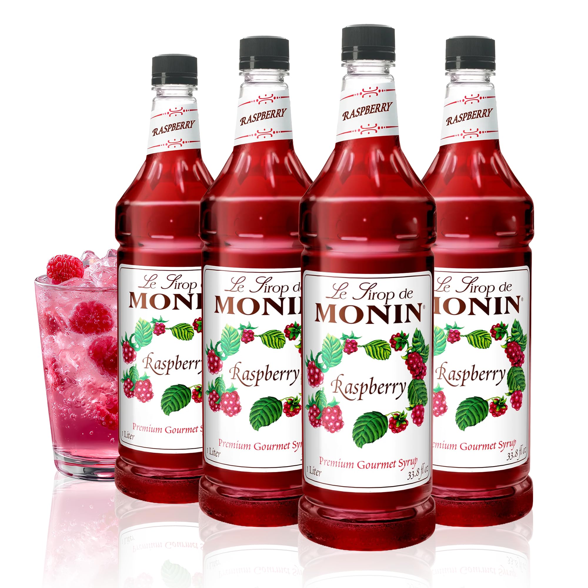 Monin raspberry syrup front bottle showing label and vibrant color benefit: clear identification