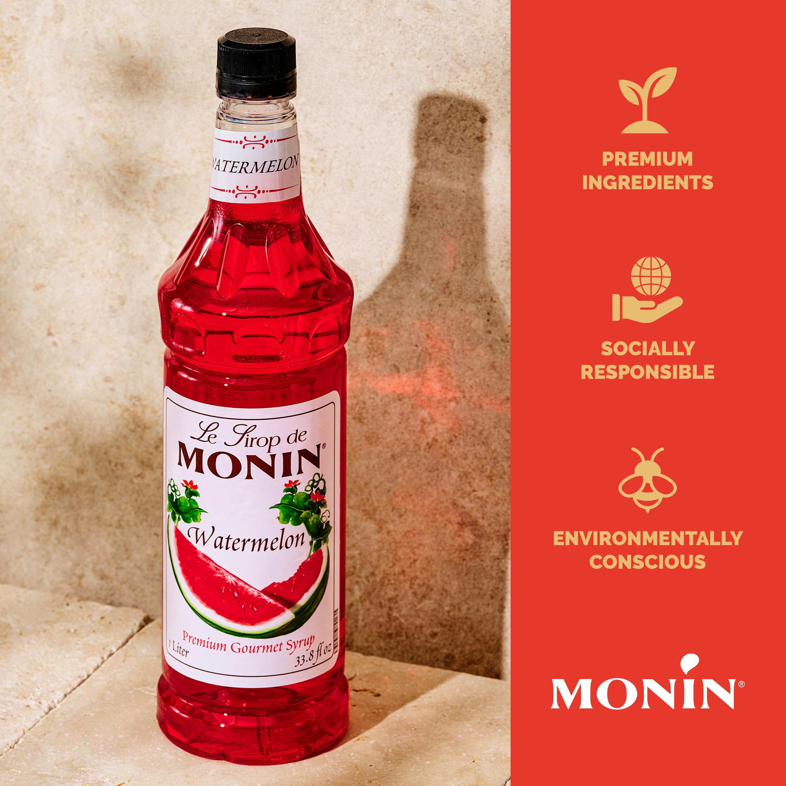 Monin syrup being added to a cocktail glass to show mixing ease and vivid fruit taste