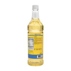 Close-up of Monin label highlighting Madagascar vanilla origin and premium quality