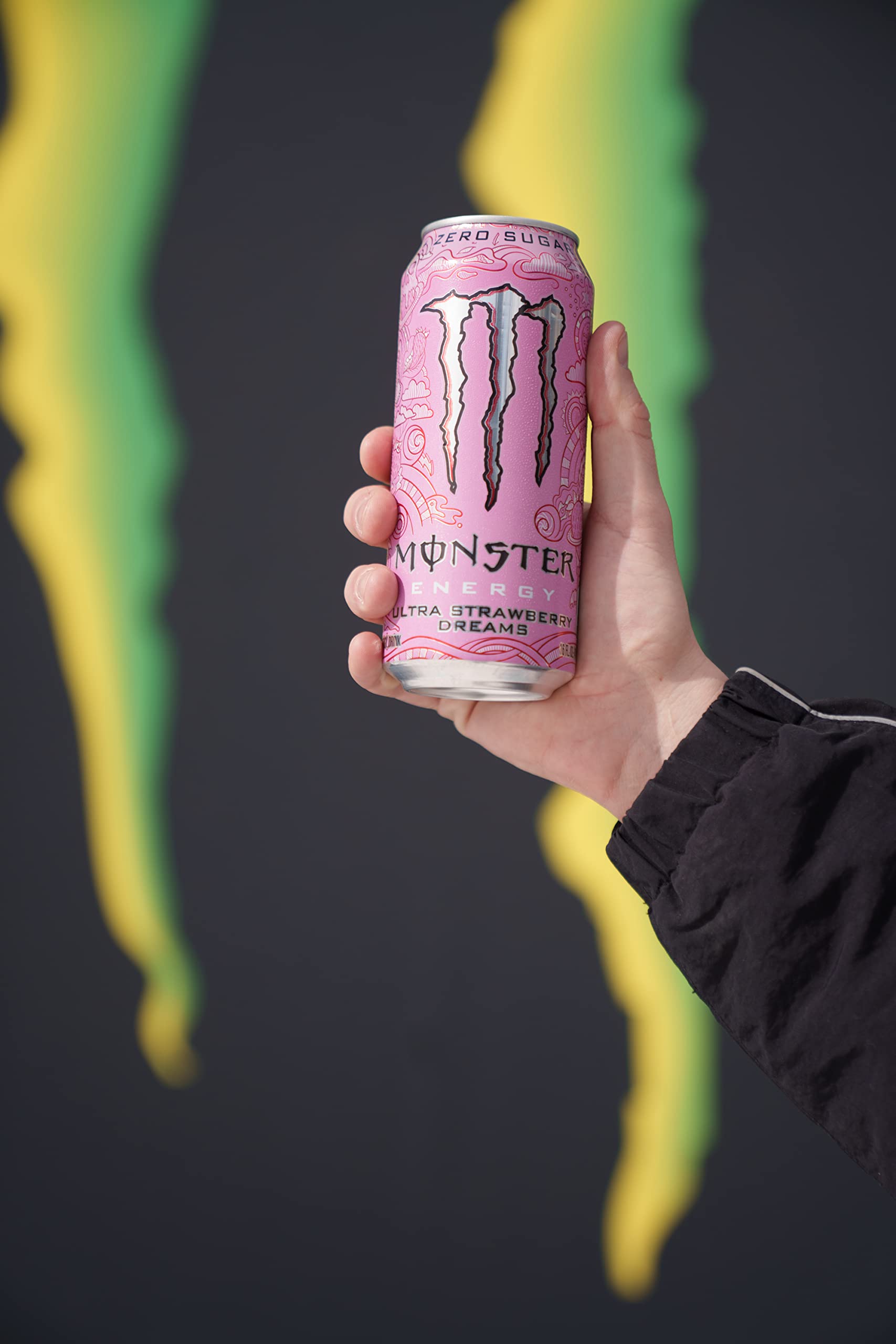 Monster Ultra Strawberry Dreams open can being poured for refreshment