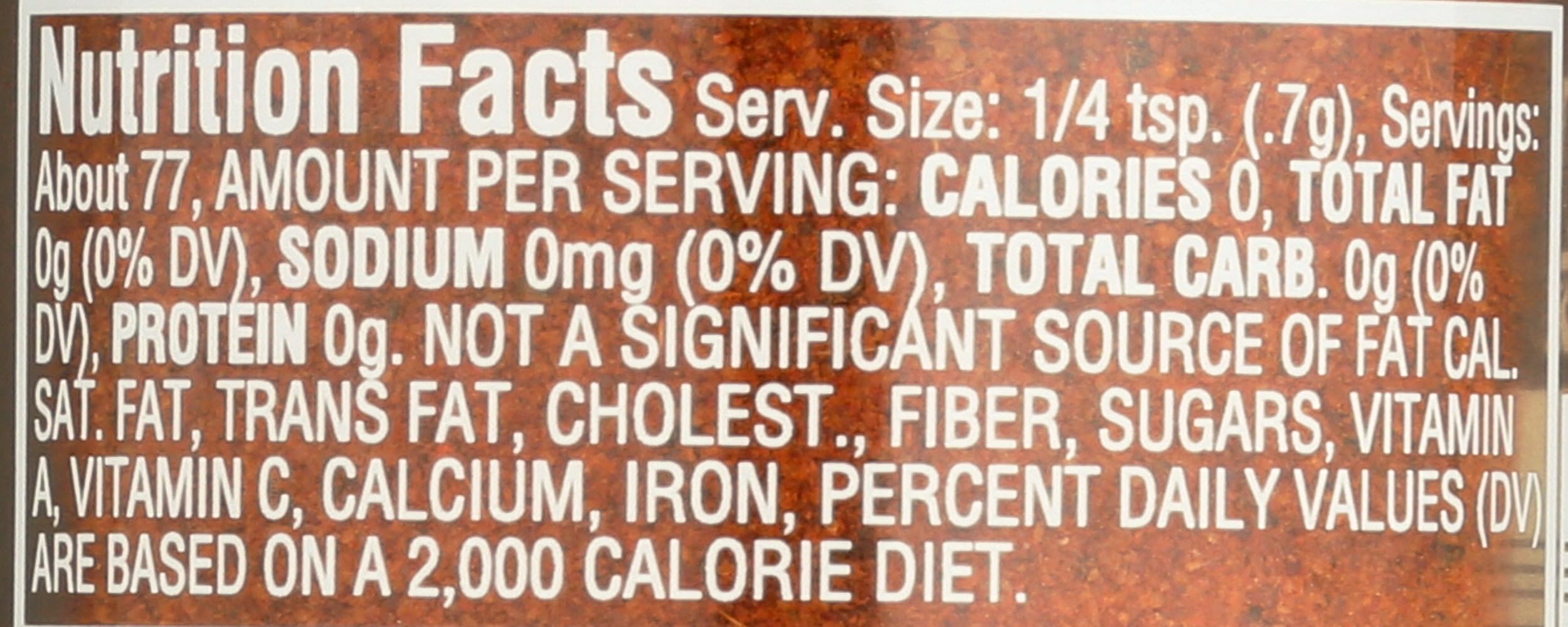 Morton & Bassett chili powder texture closeup showing fine smoky red granules for vivid flavor