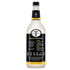 Mr & Mrs T mix splash with fresh pineapple, showcasing bright fruity flavor