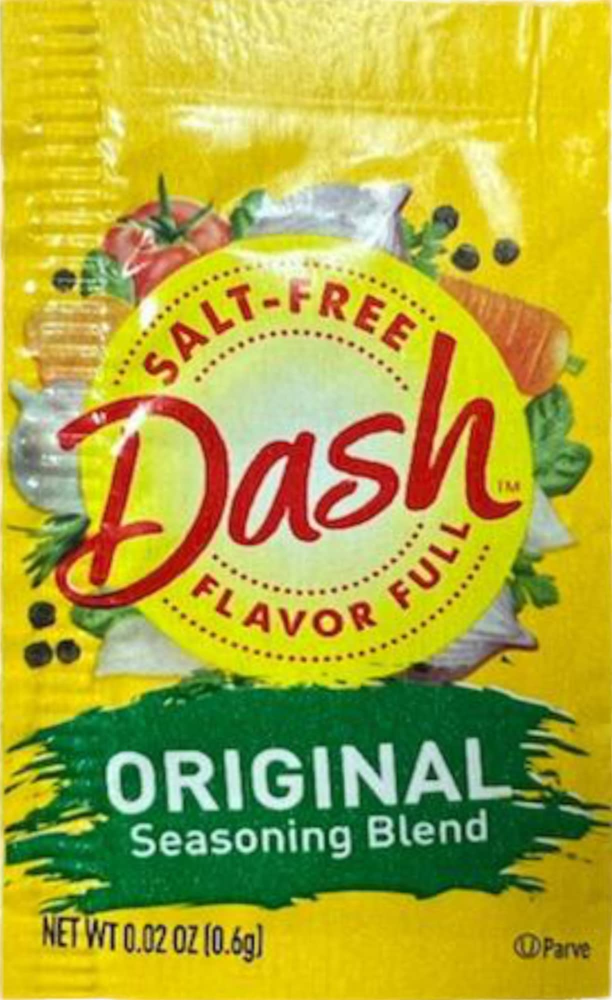Mrs. Dash seasoning sprinkled on salad adding bright herb flavor