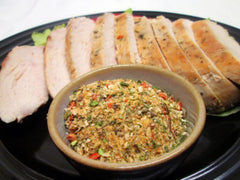 Spoon of seasoning showing Mrs. Dash texture and easy sprinkling benefit